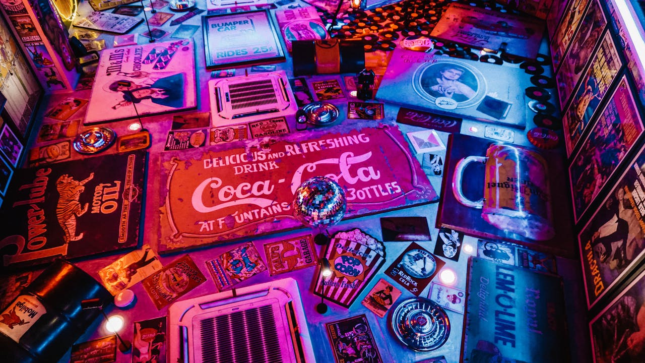 services-01 Colorful retro signage and vintage Americana decor in a captivating artistic layout with vibrant lighting.